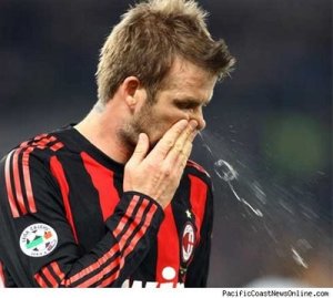 Super hot soccer player blowing a snot rocket